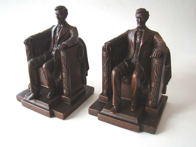 A fine pair of "Lincoln in the chair" bookends by Jennings Brothers circa 1925
